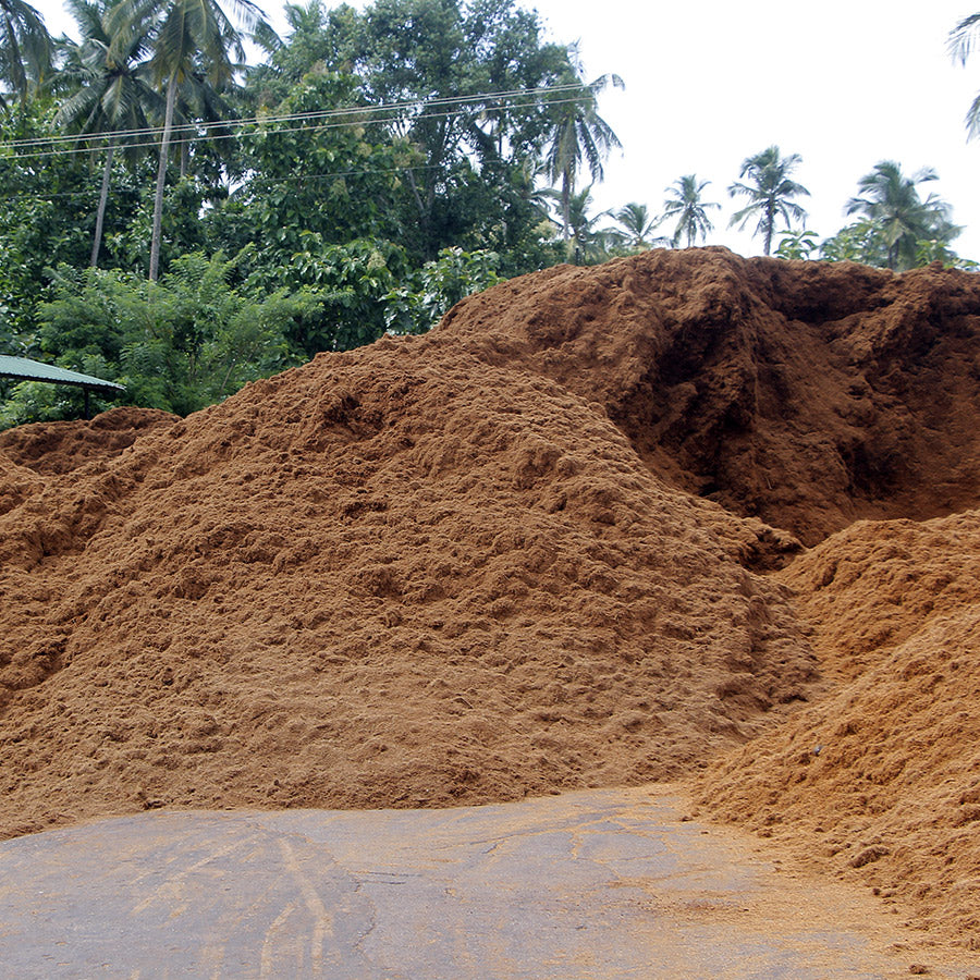 coco coir bricks hydrated and piled up